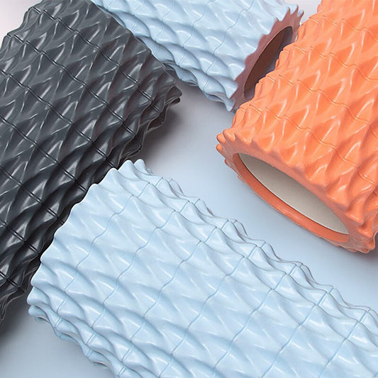 Foam massage roller collection in ocean blue, deep sea gray, and coral orange for effective muscle relief.