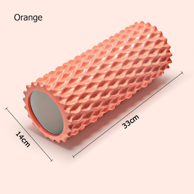 Foam massage roller in coral orange color measuring 33cm by 14cm, designed for effective muscle relaxation.