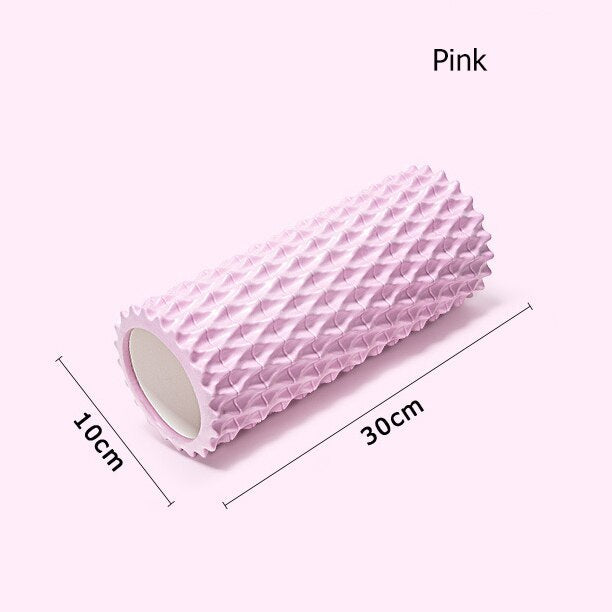Foam massage roller in pink color, measuring 30cm by 10cm, ideal for muscle recovery and flexibility.