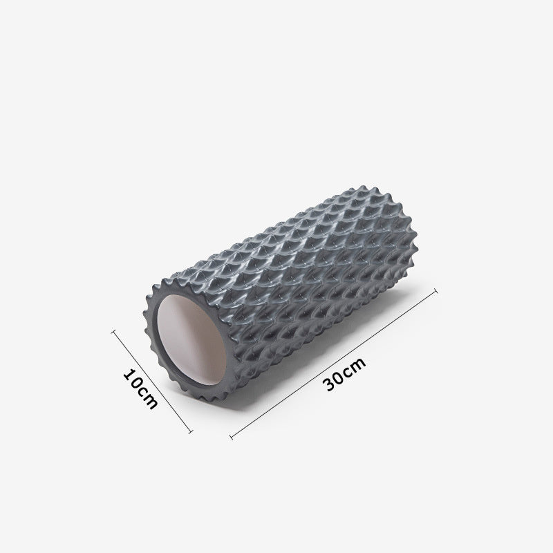 Foam massage roller in ocean blue and deep sea gray, measuring 30cm in length and 10cm in diameter.