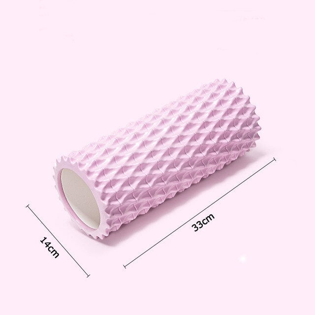Foam massage roller in pink color, 33cm size, designed for deep tissue massage and relaxation.