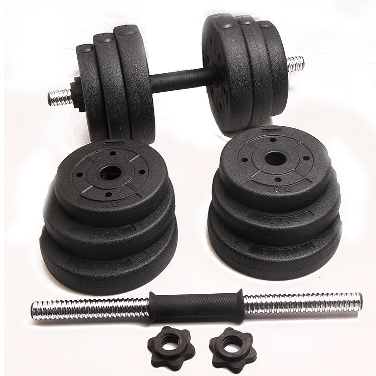 Set of adjustable dumbbells with weight plates and connectors on a white background